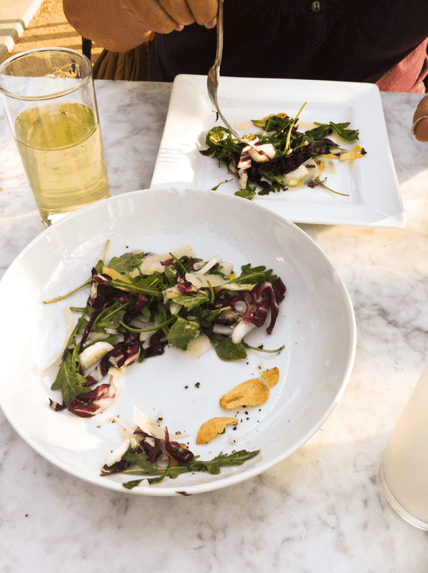 arugala and fried garlic salad at birba