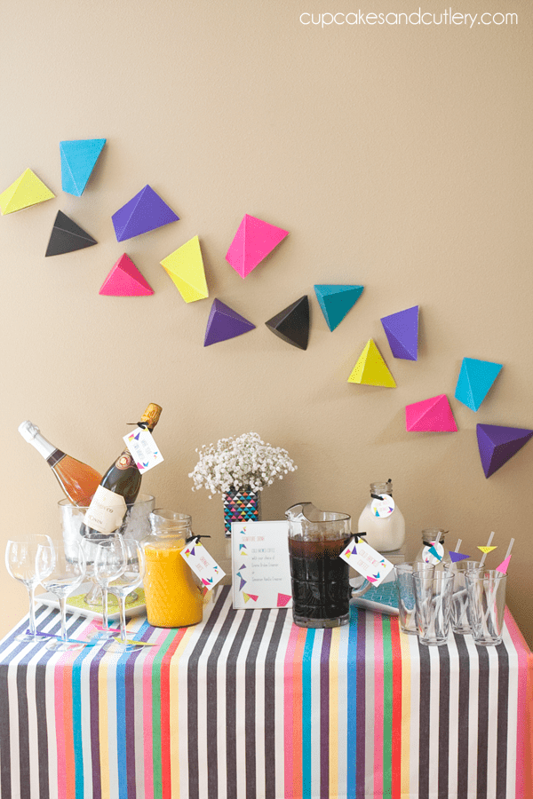 A decorated buffet table for a back to school brunch party with champagne and coffee. 