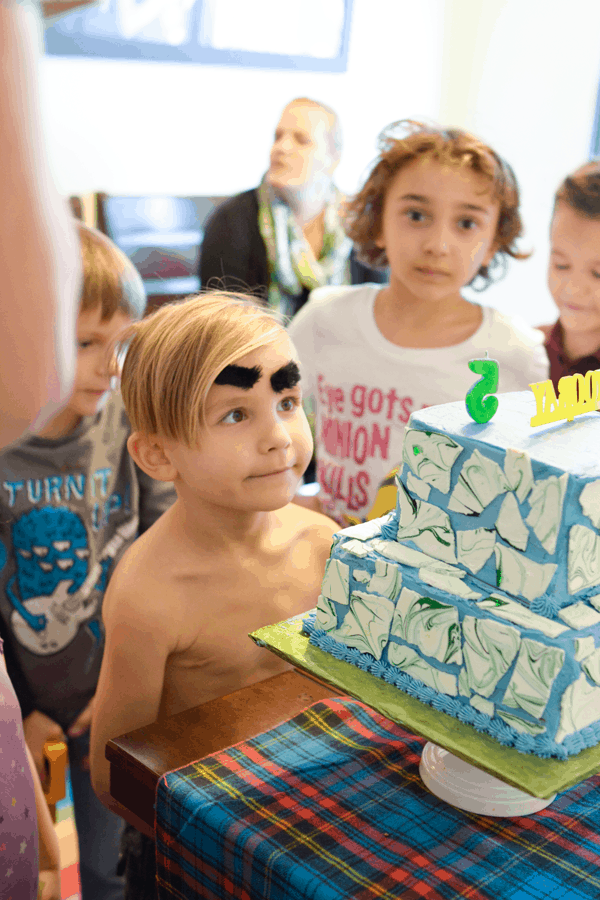 Cake time at kid's birthday party.