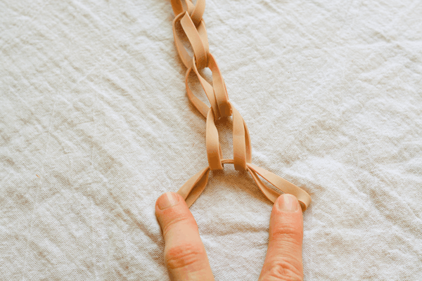 How to make a loom bracelet inspired rubber band garland.  //  www.cupcakesandcutlery.com