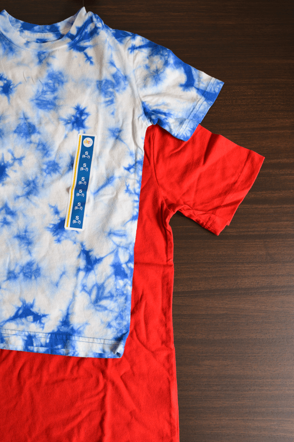 Blank kid's t shirts on a table for decorating for fourth of July