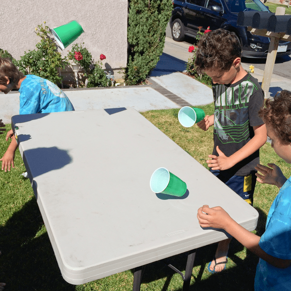 Kid-friendly flip cup for a fun birthday party activity. // www.cupcakesandcutlery.com