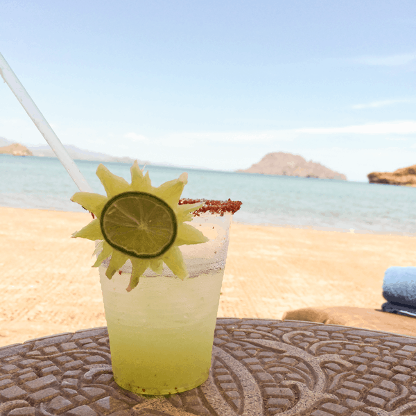 Drinks on the beach at Villa del Palmar Loreto. 