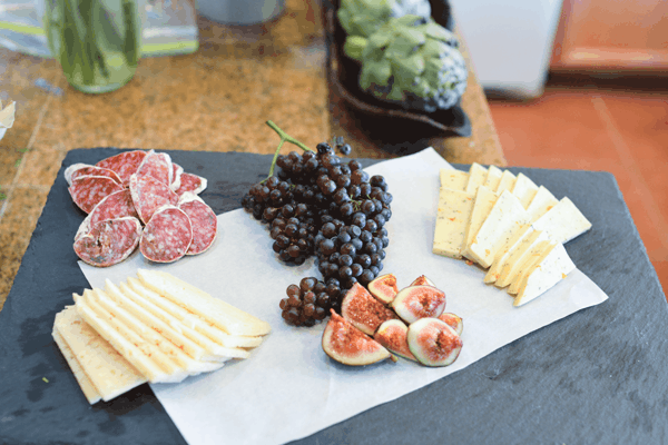 Homemade charcuterie platter on a table.