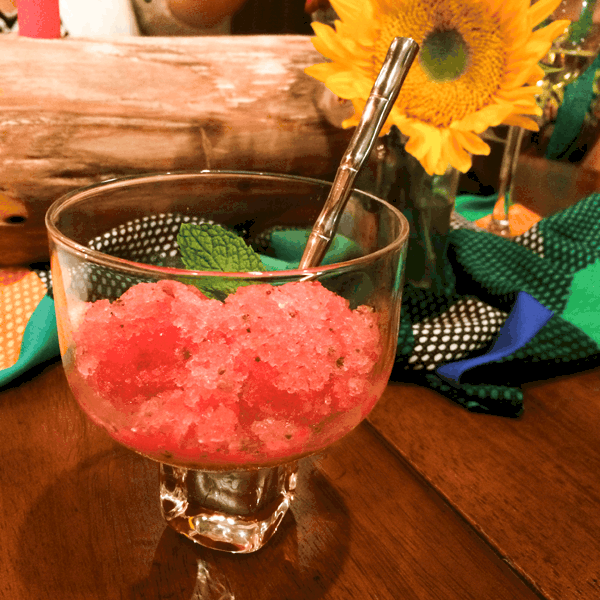 Watermelon granita in a bowl on a table. 