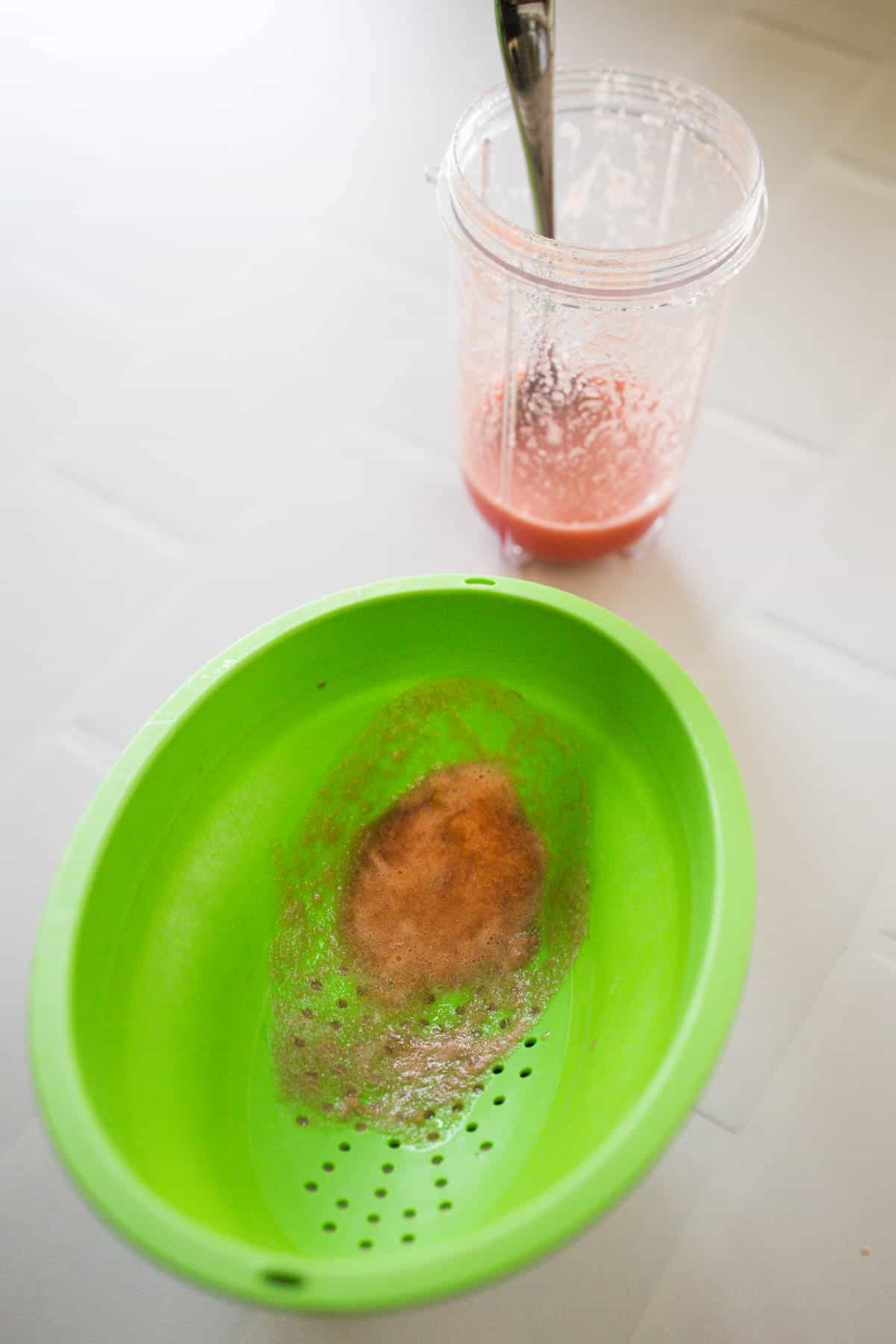 How to strain fresh watermelon juice for a mimosa.