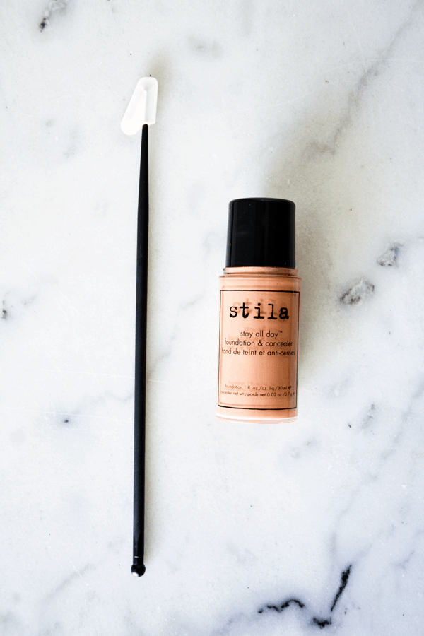 Use a makeup spatula to get every drop of foundation from the bottle.