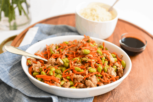 Small white bowl of a teriyaki ground turkey stir fry recipe for a family dinner.