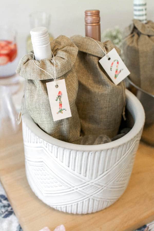 Ice bucket with wine in bags for a blind tasting.