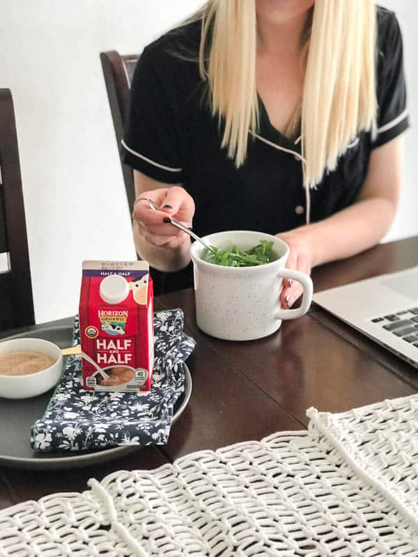 Enjoying baked eggs with arugula made creamy with Horizon Organic Half and Half.