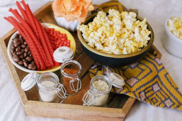 A tray of movie snacks for an at home date night. 