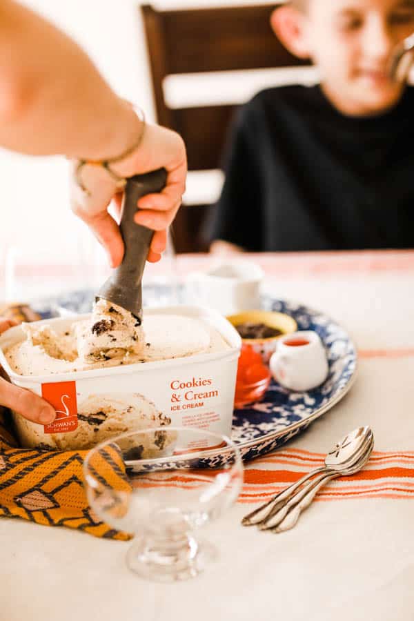 Woman scooping ice cream.