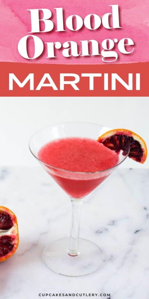 Close up of a blood orange martini in a martini glass.