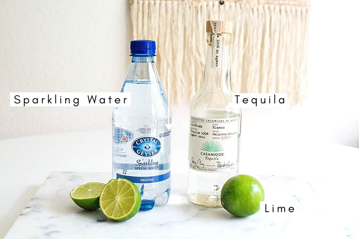 Labeled ingredients to make a super skinny margarita recipe with casamigos tequila.