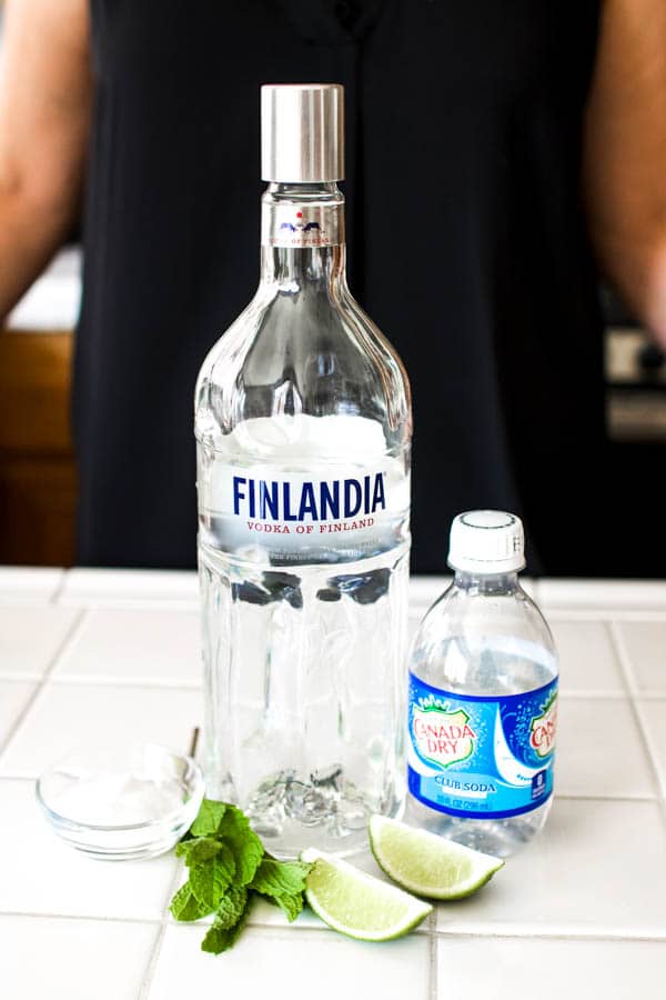 Ingredients for vodka mojito recipe on a counter.