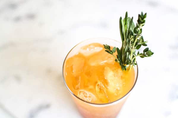 A photo of the top of a glass with vodka and apple juice for the perfect easy cocktail.