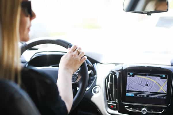 woman driving a Chevy Traverse.