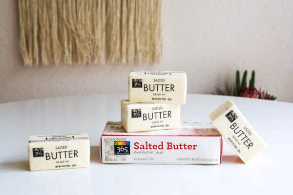 butter stacked on a table for dump cake recipes