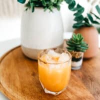 Pumpkin Spice Margarita in a glass sitting on a tray