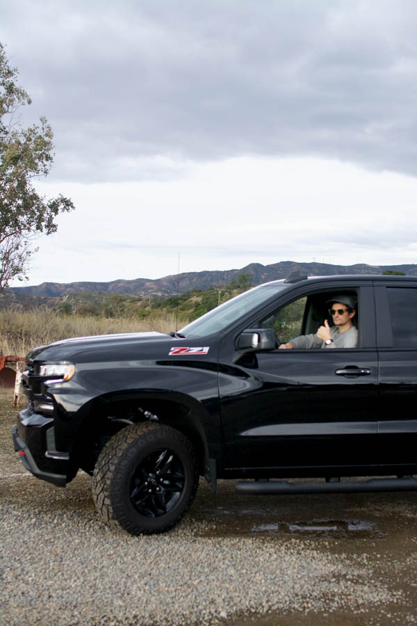 Man driving 2019 Chevy Silverado.