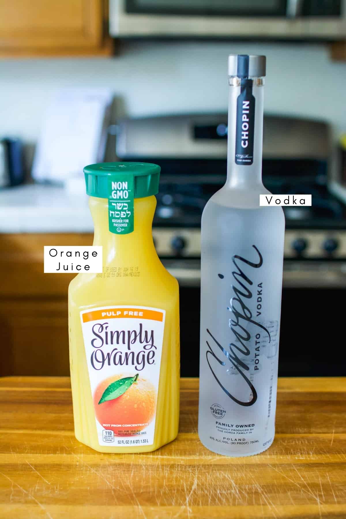 Labeled ingredients to make a screwdriver.