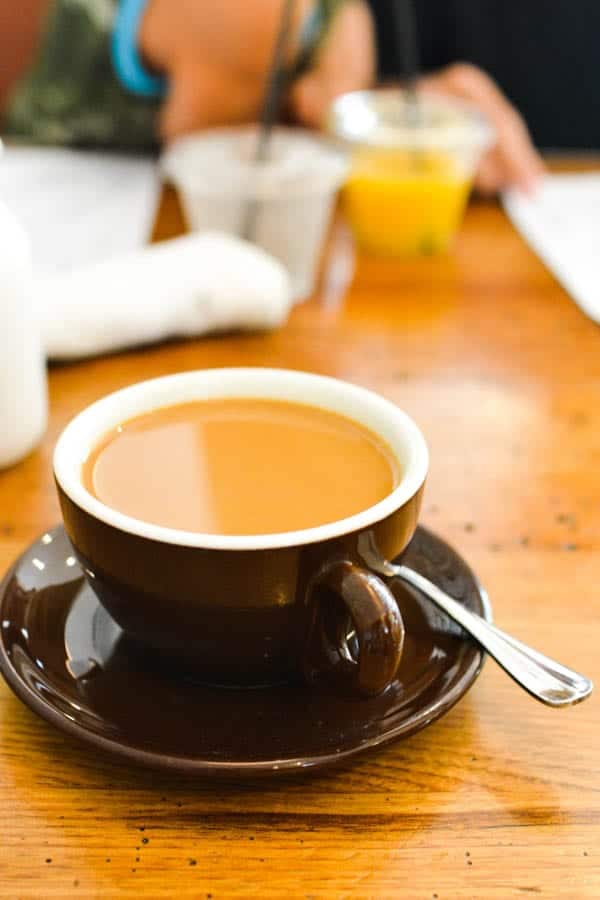 A cup of coffee on a table