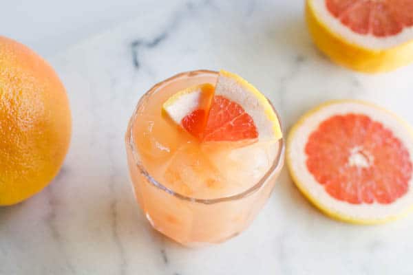 Over head shot of cocktail with grapefruit garnish.