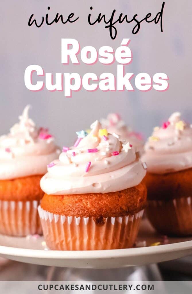 Rose Cupcakes topped with pink frosting on a plate.