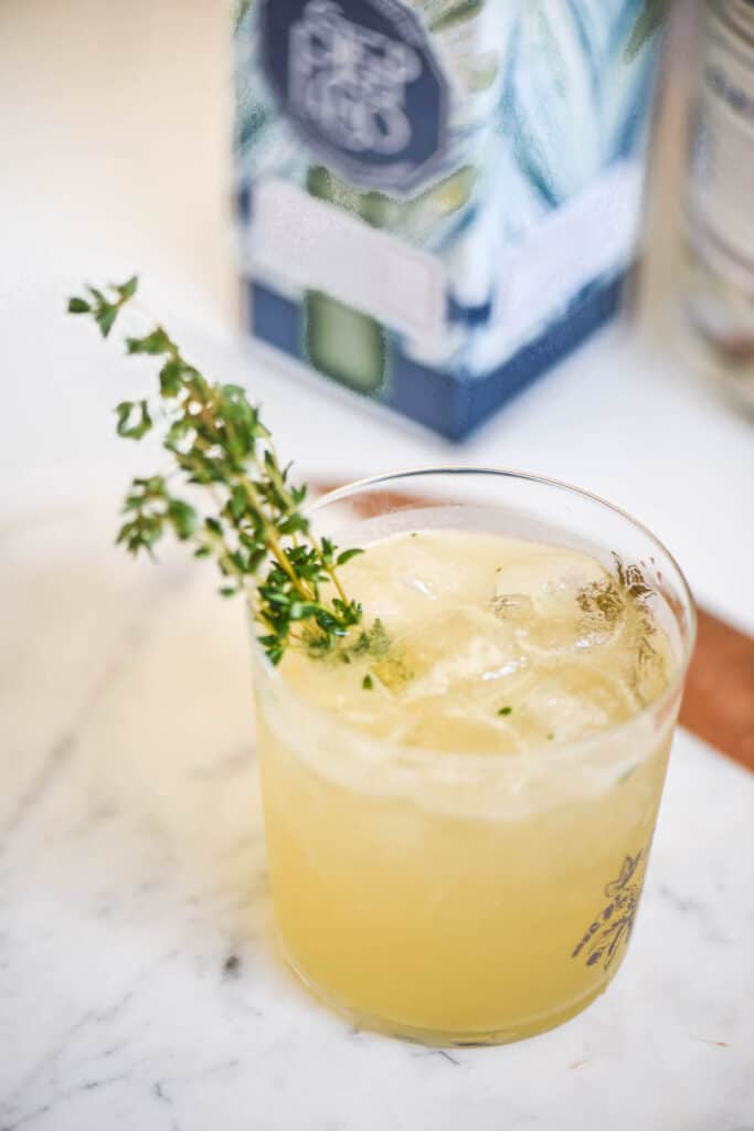 Close up of a gimlet made with herbal tea.