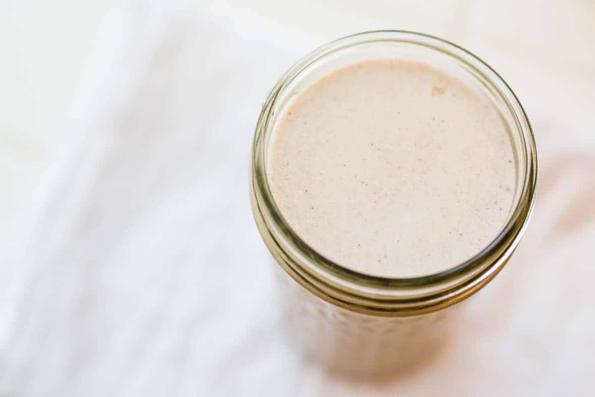 Overhead view of Cinnamon Coffee Creamer in a jar. 