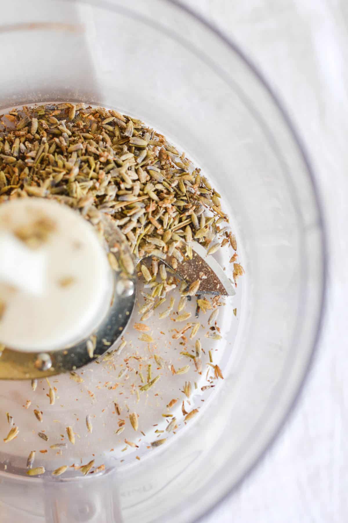 Lavender buds in a small food processor.