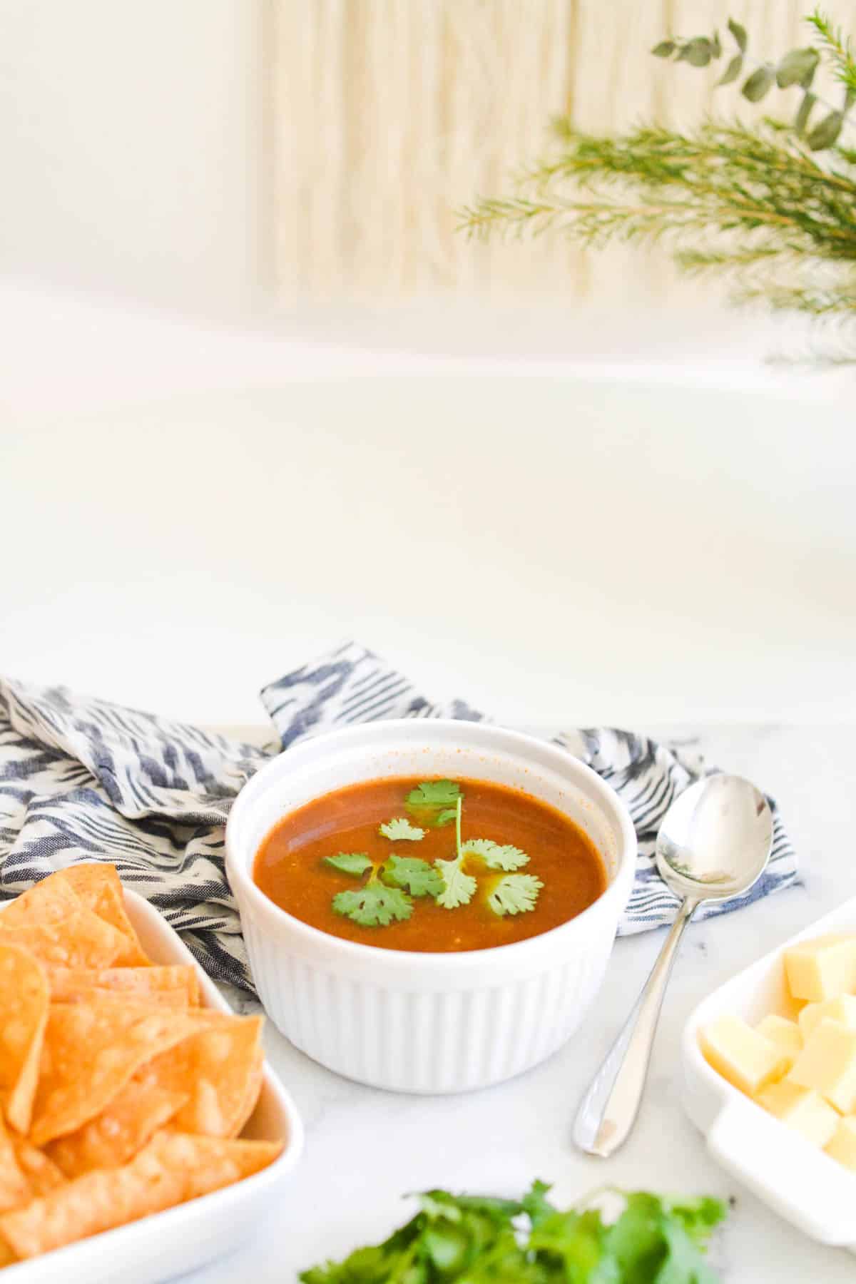 bowl of soup on a table.