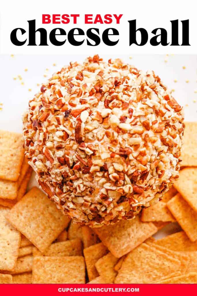 Close up image of a cheese ball surrounded by crackers with the text that reads Best Easy Cheese Ball.