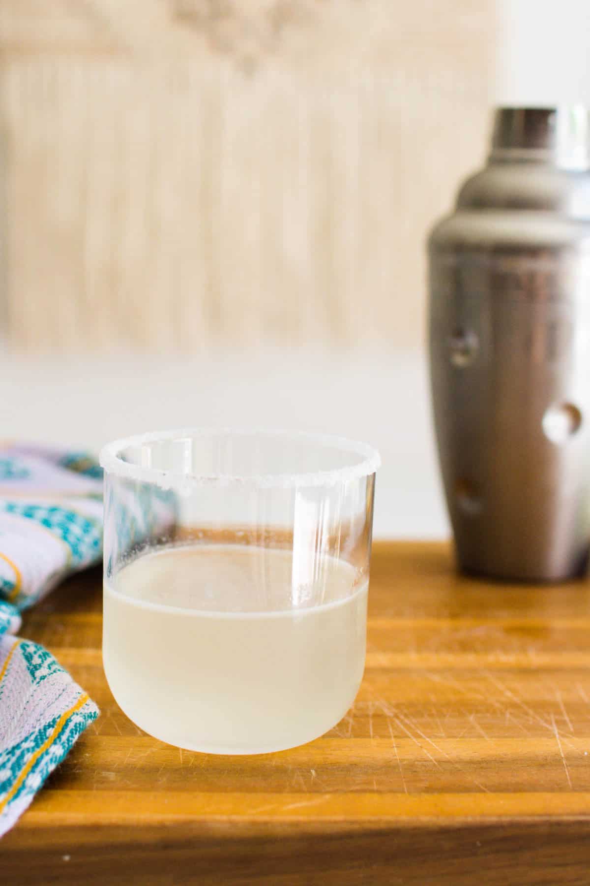 Delicious lemon drop cocktail in a glass with a sugared rim. 