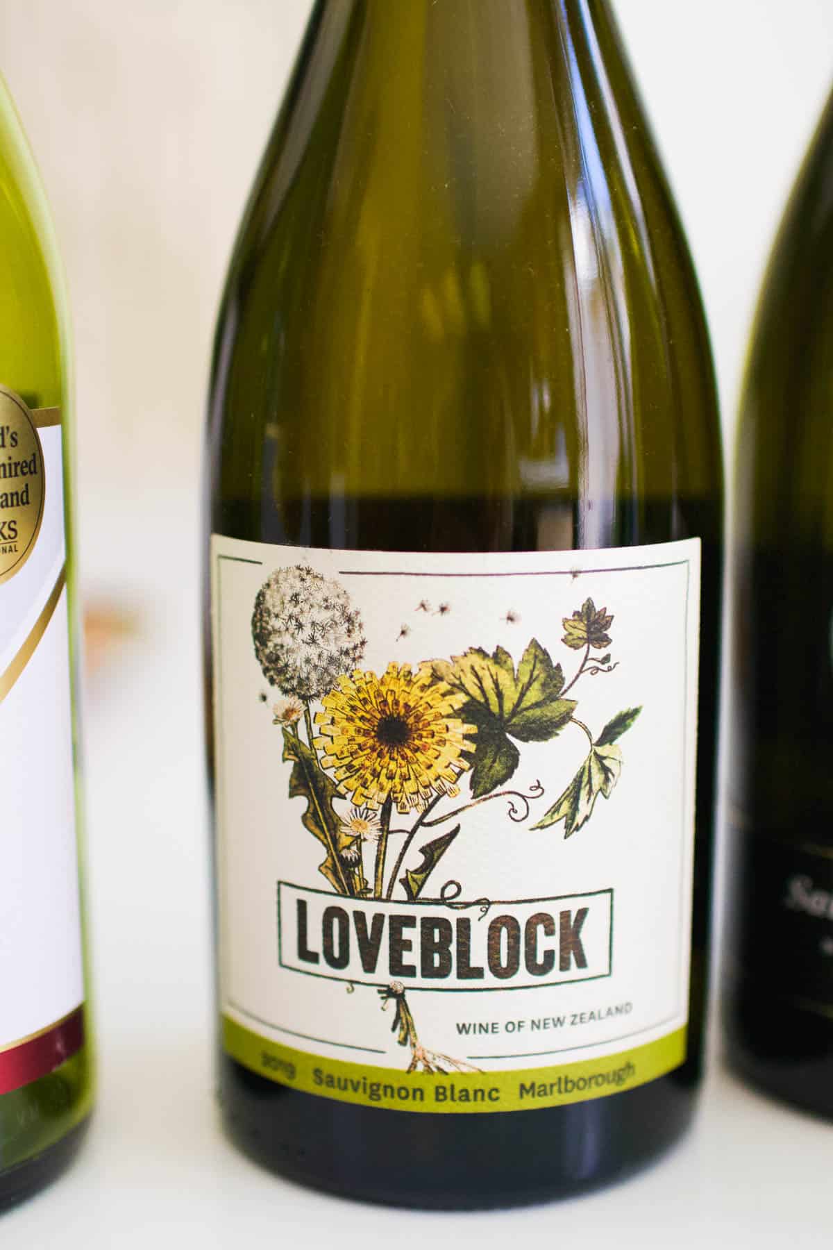 Close up of a Loveblock Sauvignon Blanc bottle.