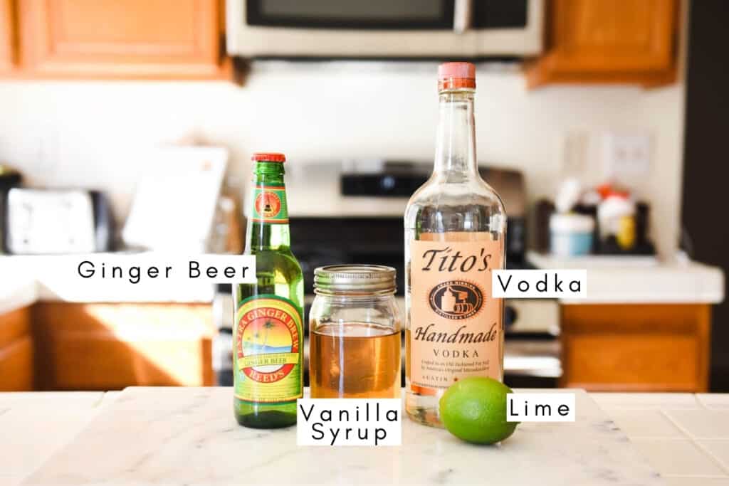 Labeled ingredients to make a vanilla mule.