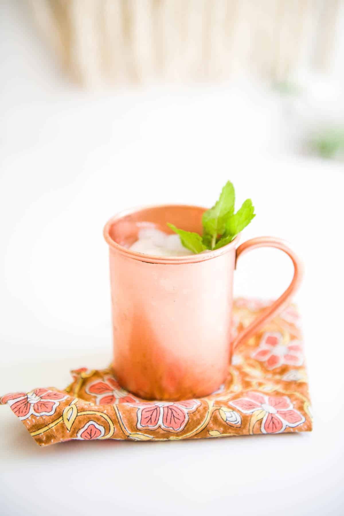 Copper Moscow Mule mug holding a non-alcoholic Moscow Mule.