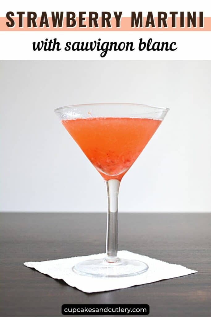 Text - Strawberry Martini with sauvignon blanc. And a martini glass with a bright pink cocktail on a table.