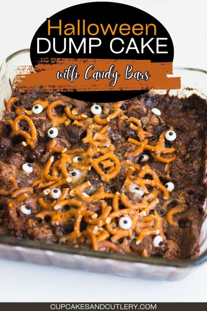 Text: Halloween Dump Cake with candy bars with a small baking dish holding a chocolate dump cake topped with pretzels and candy eyes.