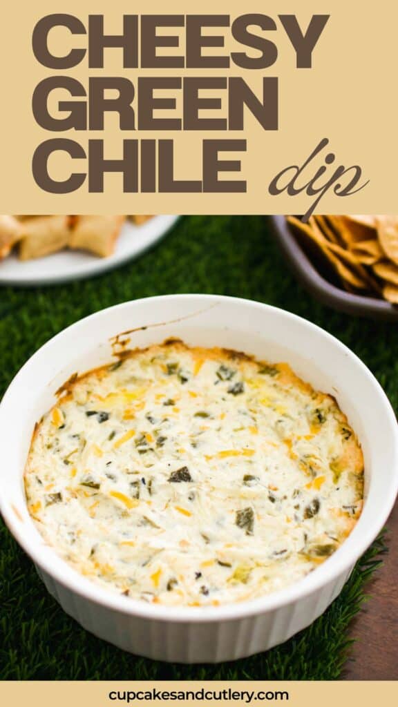 Text: Cheesy Green Chile Dip with a white baking dish holding a creamy dip.