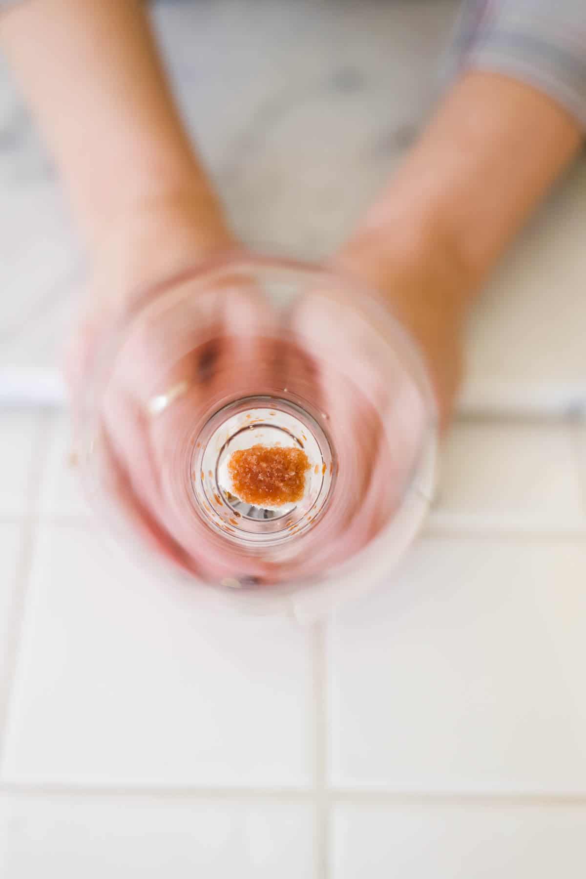 Sugar cube soaked with bitters in the bottom of a champagne flute.