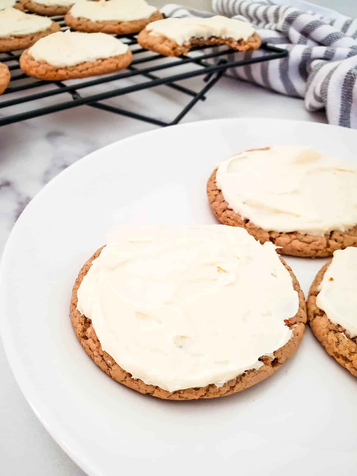 Carrot Cake Mix Cookies from boxed cake mix frosted with cream cheese icing.