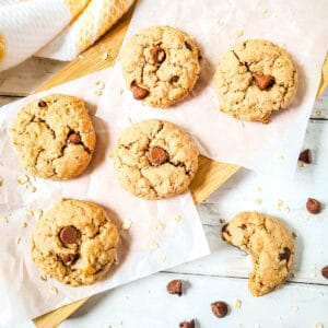 Spice cake oatmeal cake mix cookies spread out on a table.