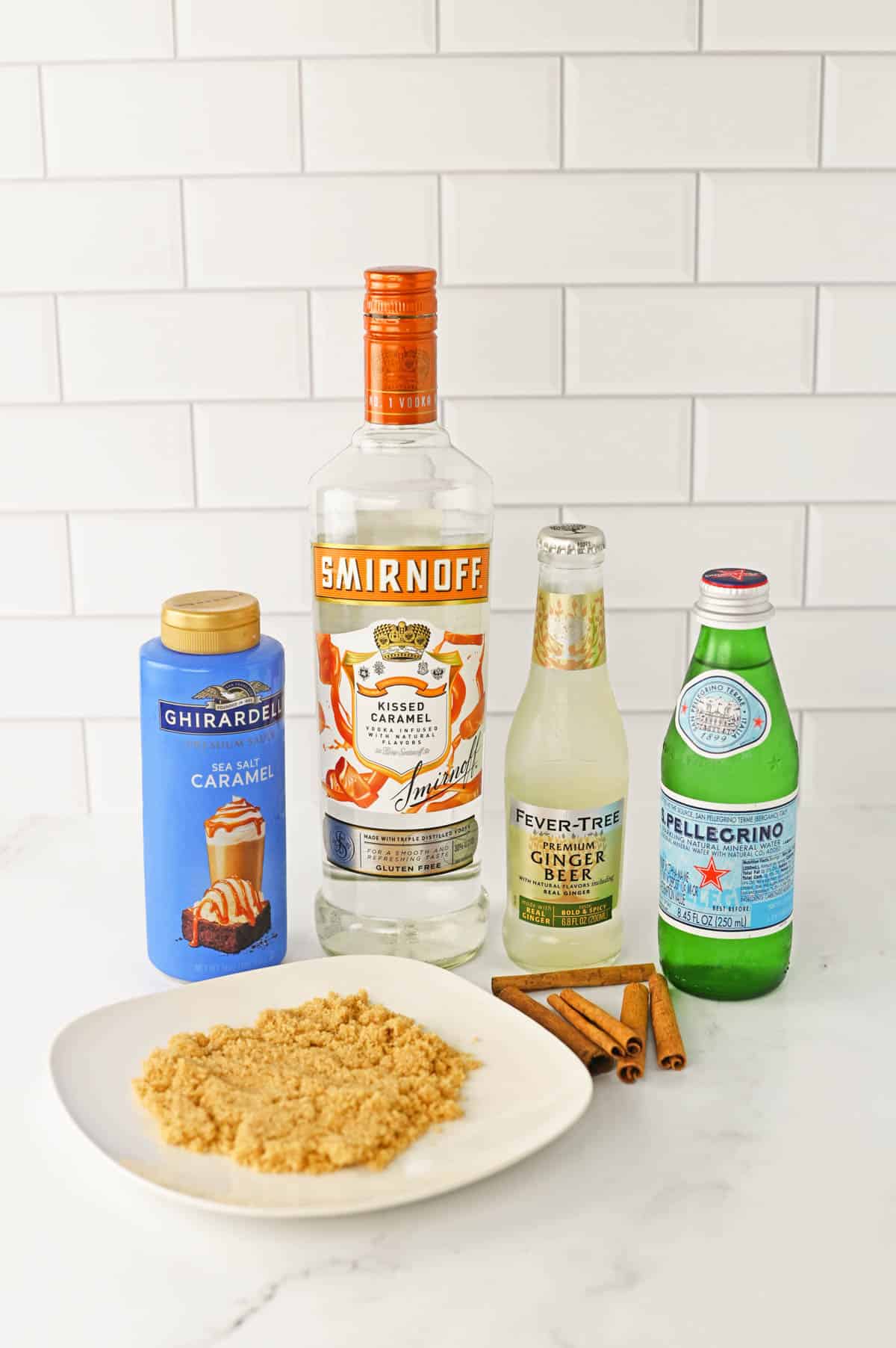 Ingredients for a Salted Caramel Moscow Mule on the countertop.