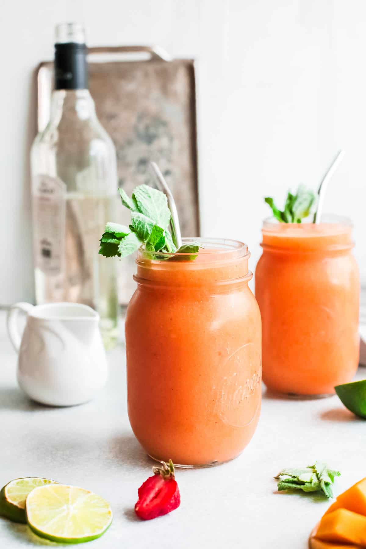 Two frozen daiquiris in jam jars.